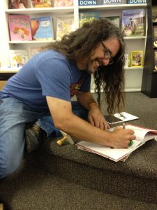 Signing some stock at Children's Book World in Haverford, PA on realease day.